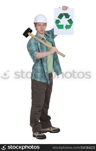Worker holding recycle poster