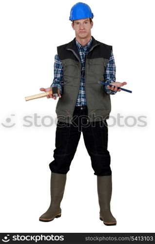 Worker holding tools