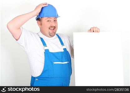 Worker holding up a blank sign