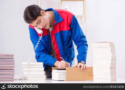 Worker in publishing house preparing book order