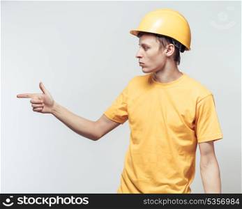 Worker in yellow helmet