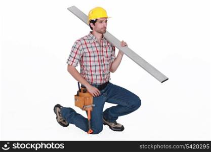 Worker kneeling down