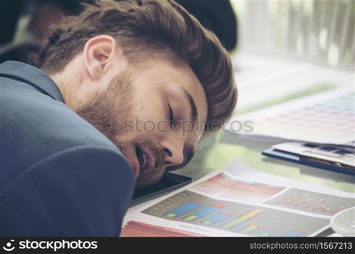 Worker lazy person sleep exhausted with tired meeting. Diversity group of business people sleeping in conference room after meeting. Executive boss and team unhappy depressed in bored conference.