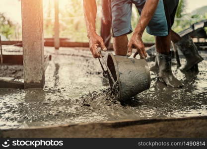 worker mix cement working in construction site