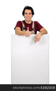 Worker pointing white plate