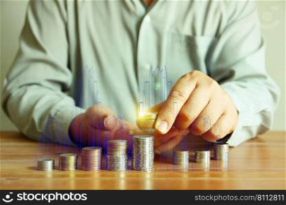 worker put on pieces of coin on coin stack with illustration of idea building , business concept