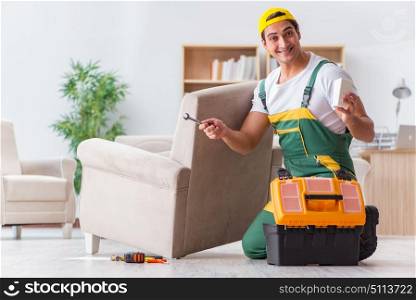Worker repairing furniture at home