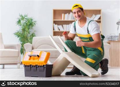 Worker repairing furniture at home