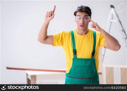 Worker wearing protective goggles at construction site
