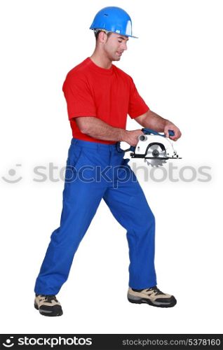 Worker with a circular saw.