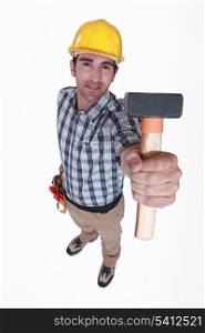 Worker with a mallet