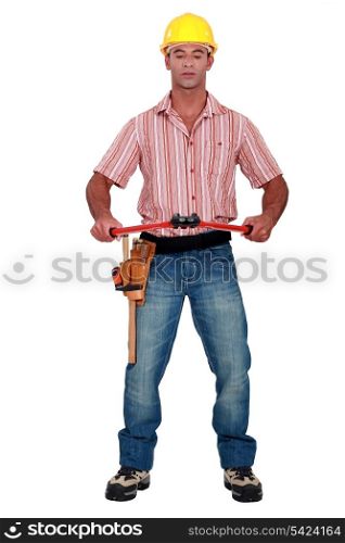 Worker with a pair of boltcutters