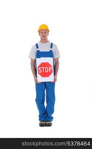 Worker with a stop sign