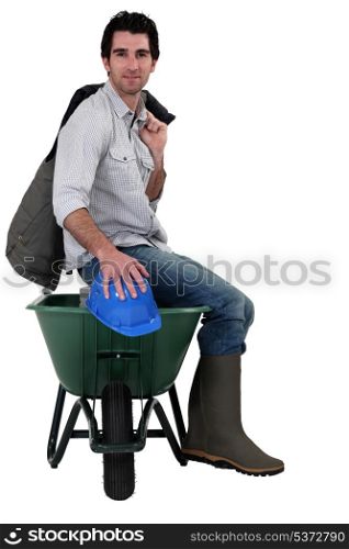 Worker with a wheelbarrow