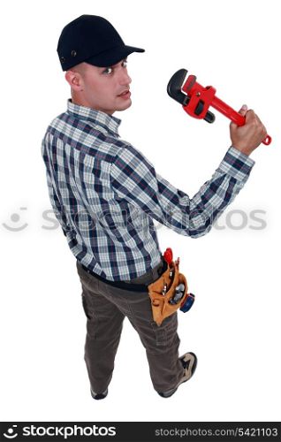 Worker with an adjustable wrench