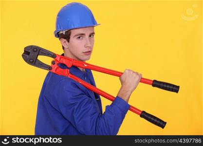 Worker with bolt cutters
