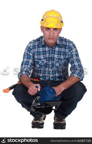 Worker with circular saw