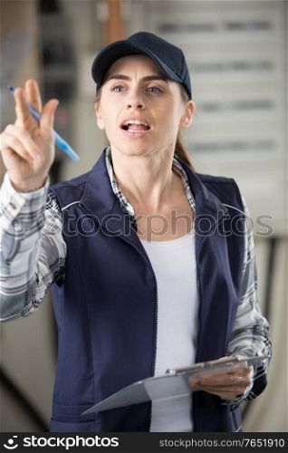 worker with clipboard calling a worker