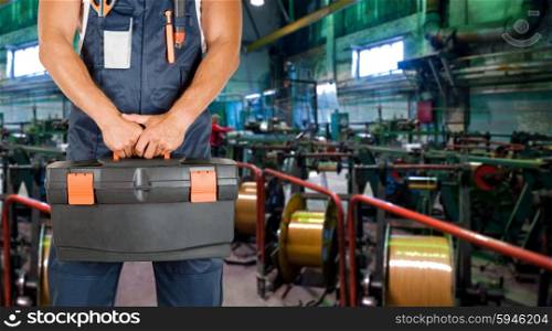 Worker with instruments. Worker with instruments at industrial factory