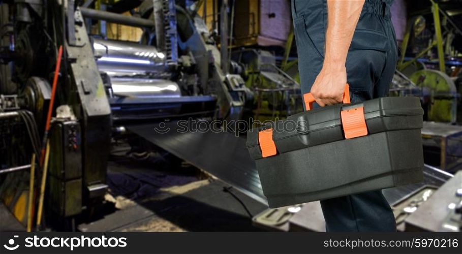 Worker with instruments. Worker with instruments at industrial factory