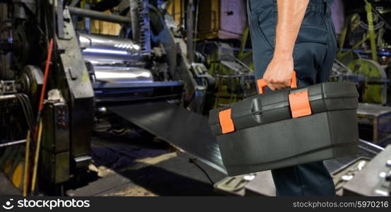 Worker with instruments. Worker with instruments at industrial factory