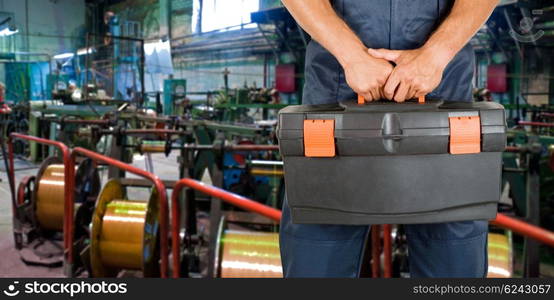 Worker with instruments. Worker with instruments at industrial factory