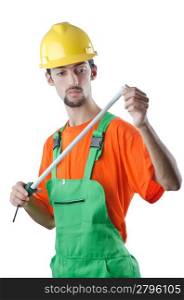 Worker with measuring tape on white