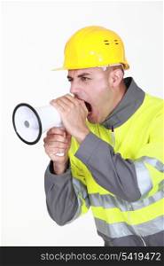 Worker with megaphone