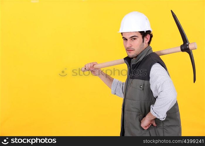 Worker with pick-axe