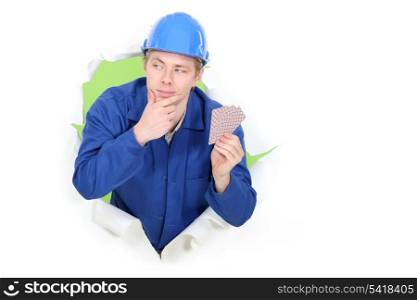 Worker with playing cards