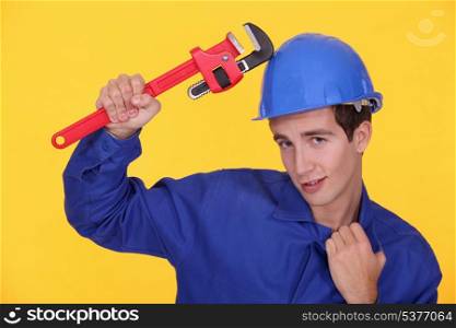 Worker with wrench