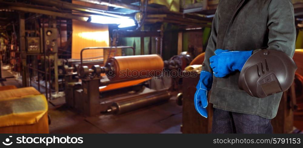 Worker . Worker with instruments at industrial factory