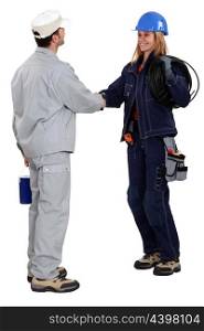 Workers greeting each other