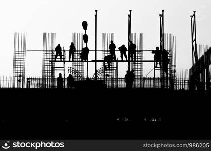 Workers on a building in construction