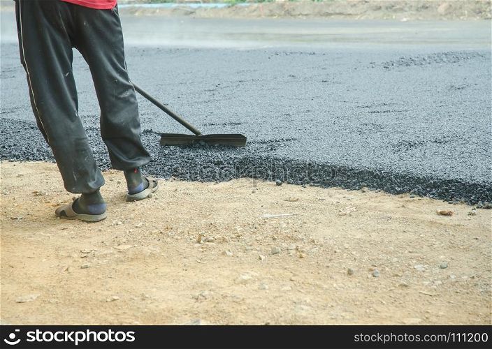 Workers on a road construction, Asphalt road construction