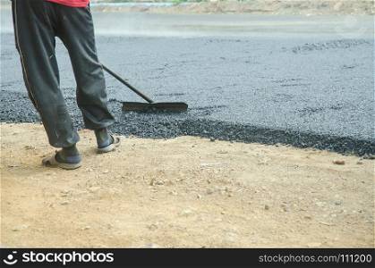 Workers on a road construction, Asphalt road construction