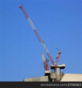 working crane against beautiful sky