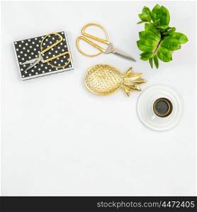 Working desk with office supplies, coffee, green plant. Flat lay social media blogger