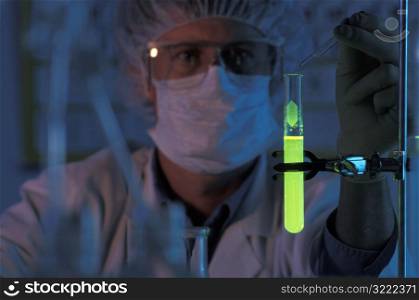 Working in a Lab with a Glowing Test Tube