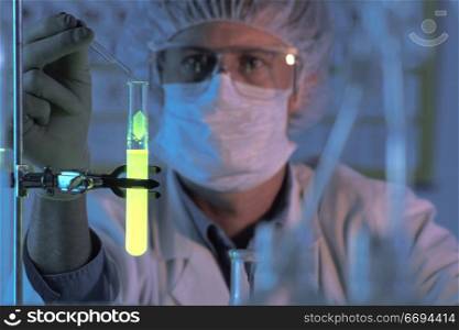 Working in a Lab with a Glowing Test Tube