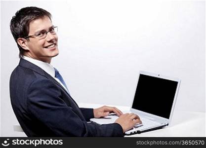 Working man with a laptop on a white background
