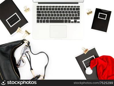 Working place with Christmas decoration on white background. Fashion flat lay for social media