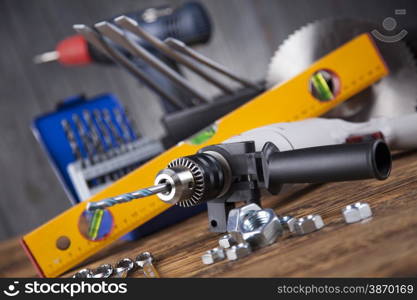 Working tools on wooden background