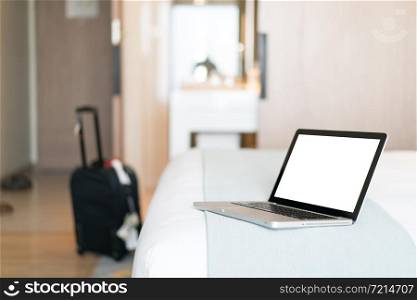 Working with a laptop on the bed