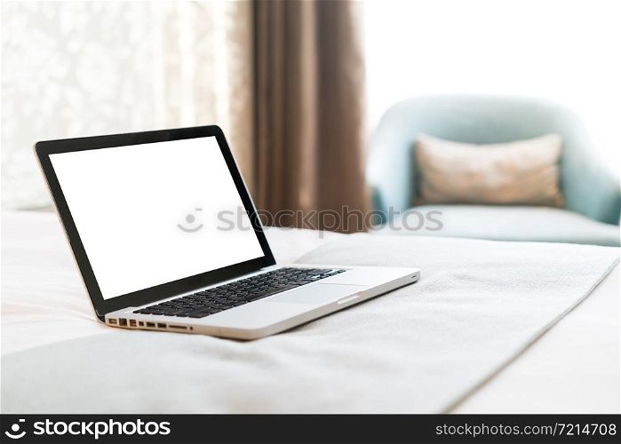 Working with a laptop on the bed