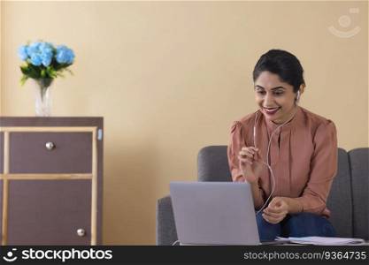 Working woman having a meeting with client over a video call