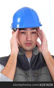 workman having migraine