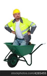 Workman in a wheelbarrow