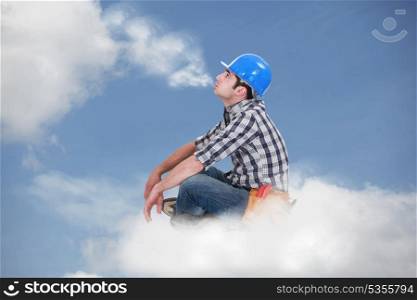 Workman sat on a cloud