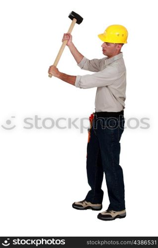 Workman using hammer, on white background